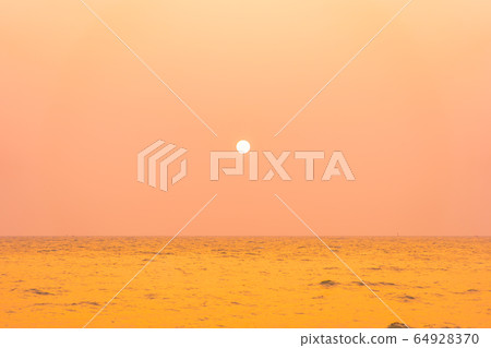 Beautiful tropical nature of sea beach ocean at sunset or sunrise time Beautiful tropical nature of sea beach ocean at sunset or sunrise time 64928370