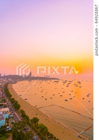 Beautiful tropical beach sea ocean bay with architecture building and ship around pattaya city Beautiful tropical beach sea ocean bay with architecture building and ship around pattaya city 64928867