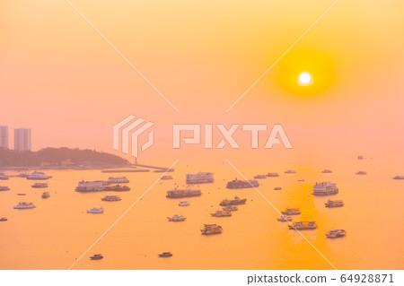 Beautiful tropical beach sea ocean bay with architecture building and ship around pattaya city Beautiful tropical beach sea ocean bay with architecture building and ship around pattaya city 64928871