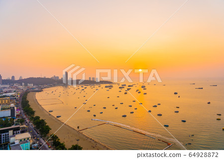 Beautiful tropical beach sea ocean bay with architecture building and ship around pattaya city Beautiful tropical beach sea ocean bay with architecture building and ship around pattaya city 64928872