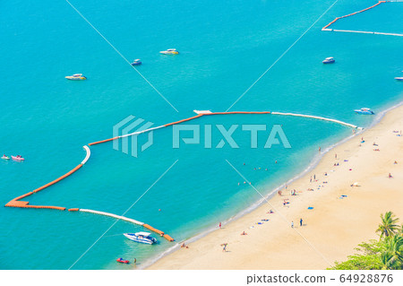Beautiful tropical beach sea ocean bay and architecture building in Pattaya city Thailand 64928876