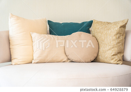 Comfortable pillow on sofa decoration interior Comfortable pillow on sofa decoration interior 64928879