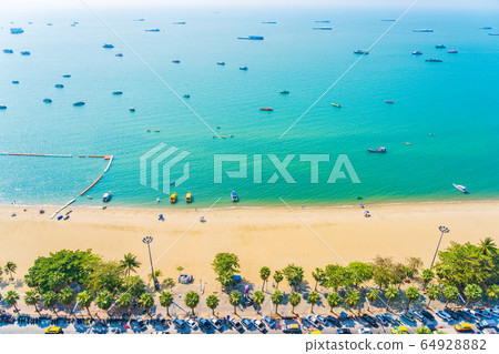 Beautiful tropical beach sea ocean bay and architecture building in Pattaya city Thailand Beautiful tropical beach sea ocean bay and architecture building in Pattaya city Thailand 64928882