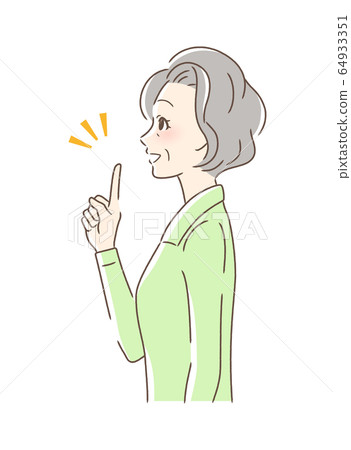 Side profile of woman smiling and pointing finger 64933351