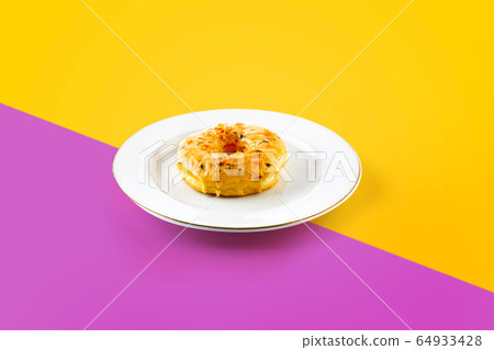 Cake on the plate in vibrant color Cake on the plate in vibrant color 64933428