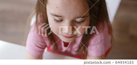 portrait of a woman in profile. The face is covered with hair. The concept of skin care, natural cosmetics, Brazilian blowout, chemistry, painting with henna portrait of a woman in profile. The face is covered with hair. The concept of skin care, natural cosmetics, Brazilian blowout, chemistry, painting with henna 64934183