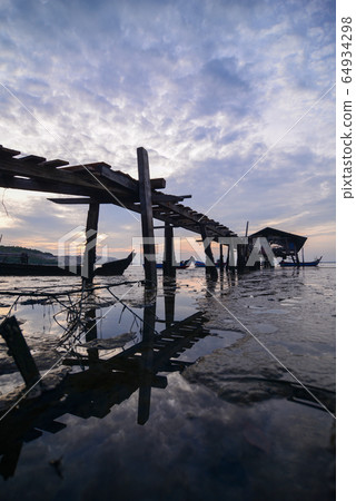 Wooden bridge at Jelutong, Penang fisherman hut 64934298