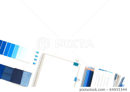 Classic Blue. Color of the Year 2020. Top view of workspace with white notebook, color palette, fabric sample and copy space. Flatlay minimalism. 64935344