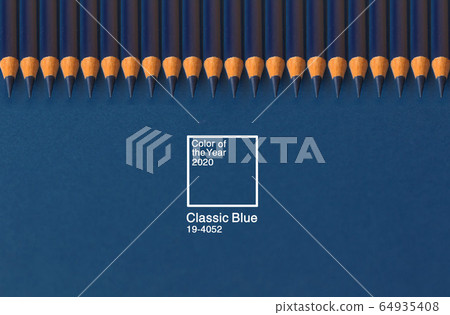 Classic blue lettering 2020. Gradient color palette. Creative pattern made of pencels on a classic blue background. Top view, flat lay, close-up. 64935408