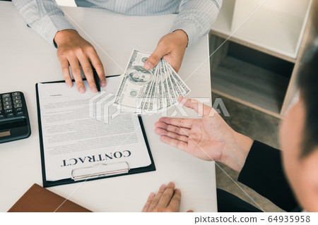 Money in the hands of businessmen who are Money in the hands of businessmen who are 64935958