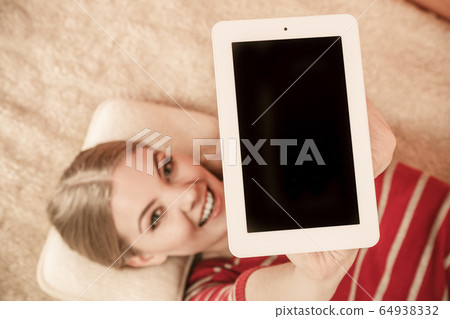 Woman holding pc tablet. Blank screen copyspace Woman holding pc tablet. Blank screen copyspace 64938332
