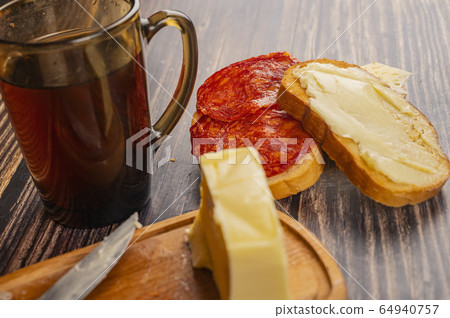 Fresh wheat toast with butter, sausage and cheese, Fresh wheat toast with butter, sausage and cheese, 64940757