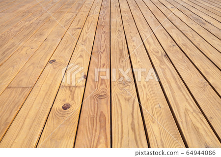 Wooden floor made of uncolored boards, background 64944086