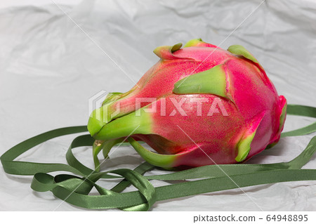 Tropical fruit dragon fruit on display 64948895