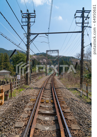 Railroad crossing near JR Gunbata Station 64950681