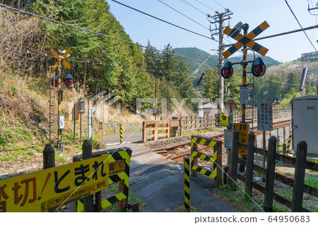 Railroad crossing near JR Gunbata Station 64950683