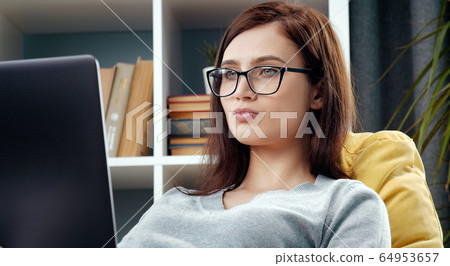 Woman working on laptop, flat Woman working on laptop, flat 64953657