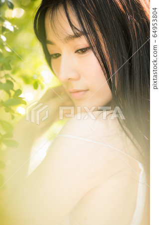 Beautiful sexy female fresh green early summer fantastic person material Beautiful sexy female fresh green early summer fantastic person material 64953804