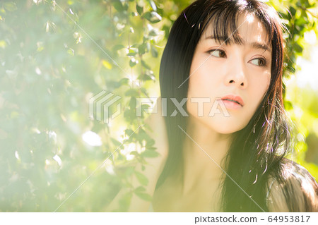 Beautiful sexy female fresh green early summer fantastic person material Beautiful sexy female fresh green early summer fantastic person material 64953817