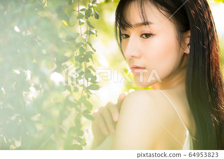Beautiful sexy female fresh green early summer fantastic person material Beautiful sexy female fresh green early summer fantastic person material 64953823