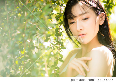Beautiful sexy female fresh green early summer fantastic person material Beautiful sexy female fresh green early summer fantastic person material 64953827