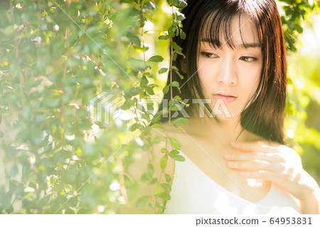 Beautiful sexy female fresh green early summer fantastic person material Beautiful sexy female fresh green early summer fantastic person material 64953831