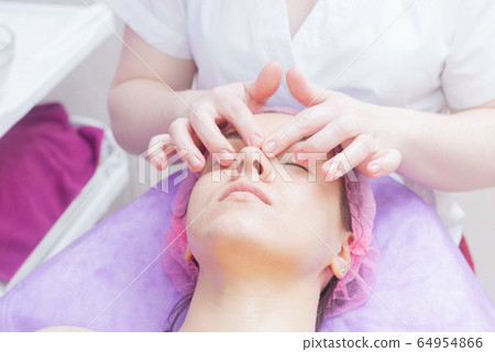 Preparation of the client for buccal massage. 64954866