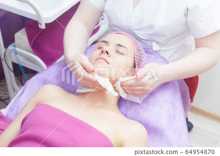 Preparation of the client for buccal massage. 64954870