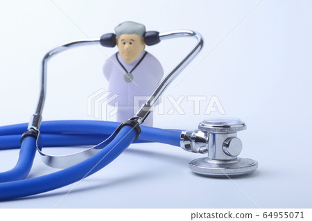 Male doctor and stethoscope in clinic office as medical concept. Male doctor and stethoscope in clinic office as medical concept. 64955071