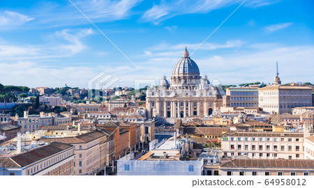 Wide view of St. Peter's Basilica and Roman cityscape 64958012