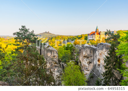 Spring landscape panorama of Bohemian Paradise, Czech: Cesky Raj. Hruba Skala castle and Trosky ruins. Czech Republic 64958315