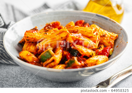 Pasta with tomato sauce with vegetables 64958325