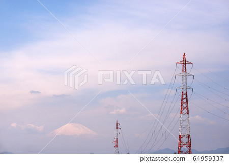 Mt. Fuji's snow hat floating in the clouds 64959337