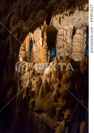 Postojna cave, Slovenia. Formations inside cave with stalactites and stalagmites Postojna cave, Slovenia. Formations inside cave with stalactites and stalagmites 64961627