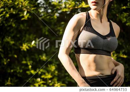 Young women exercise sports healthy outdoor park fitness person material 64964733