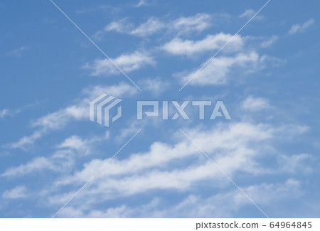 Spring clouds in the sky. 64964845