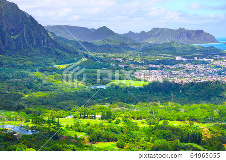 Kaneohe residential area and the Ko'olau mountains and Kualoa mountains seen from the Nuuanu Paris observatory on Oahu, Hawaii Kaneohe residential area and the Ko'olau mountains and Kualoa mountains seen from the Nuuanu Paris observatory on Oahu, Hawaii 64965055