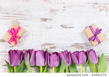 Purple tulips and gifts for different occasions Purple tulips and gifts for different occasions 64965274