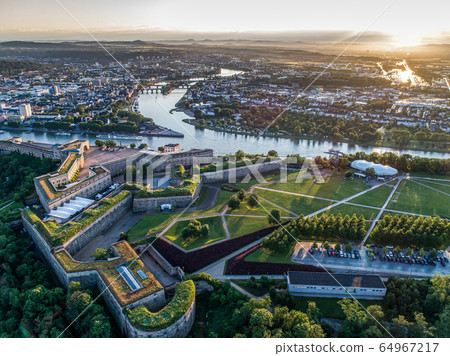 Aerial View of Ehrenbreitstein fortress and Koblenz City in Germany during sunset 64967217