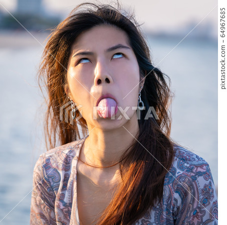 asian Woman with unhappy face, Cute Asian woman asian Woman with unhappy face, Cute Asian woman 64967685