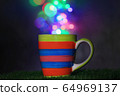 Beautifully patterned ceramic mug with bokeh 64969137