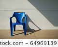 Art of Blue chair with oblique light background 64969139