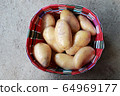 Potatoes with colorful a basket of potatoes 64969177