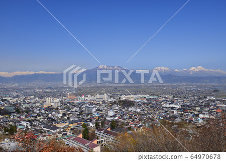 Overlooking the city of Suzaka, Nagano Prefecture 64970678