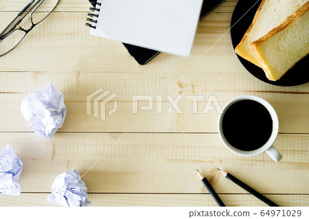 cup of hot coffee  on wooden background with 64971029