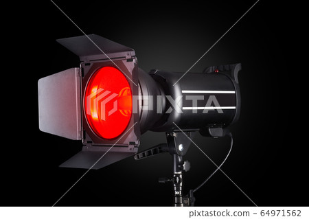 Photography studio flash isolated on black Photography studio flash isolated on black 64971562