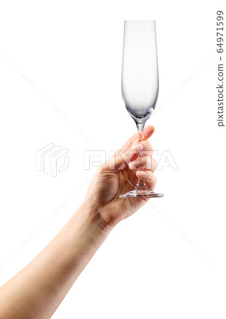 Woman hand holding empty champagne glass isolated Woman hand holding empty champagne glass isolated 64971599