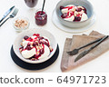 Cottage cheese pancakes with berry sauce and nuts. Healthy breakfast concept. 64971723