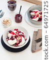 Cottage cheese pancakes with berry sauce and nuts. Healthy breakfast concept. 64971725