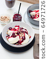 Cottage cheese pancakes with berry sauce and nuts. Healthy breakfast concept. 64971726